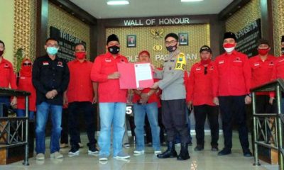 Pengurus PDIP Kabupaten Pasuruan menyampaikan surat resmi ke Kapolres Pasuruan. (ist)