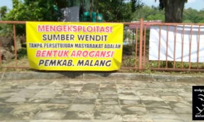 Spanduk penolakan oleh warga terkait pengambilan air PDAM Kabupaten Malang. (Ist)
