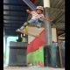 Lil Joko saat melakukan gerakan trik skateboard.